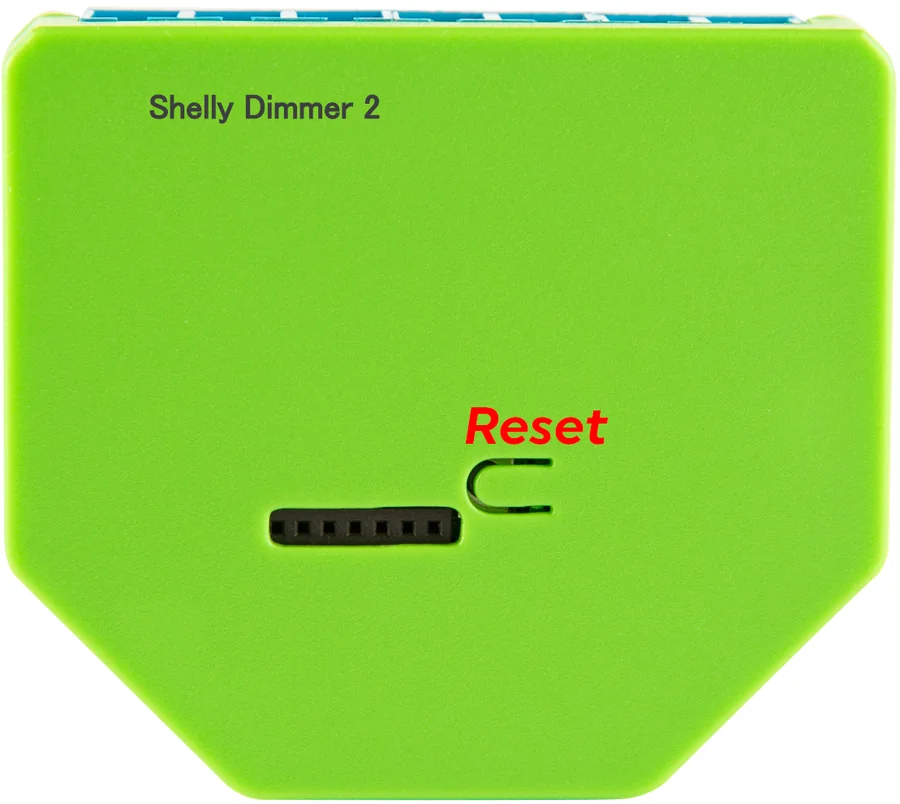 Shelly Dimmer 2 with the reset button marked on the housing